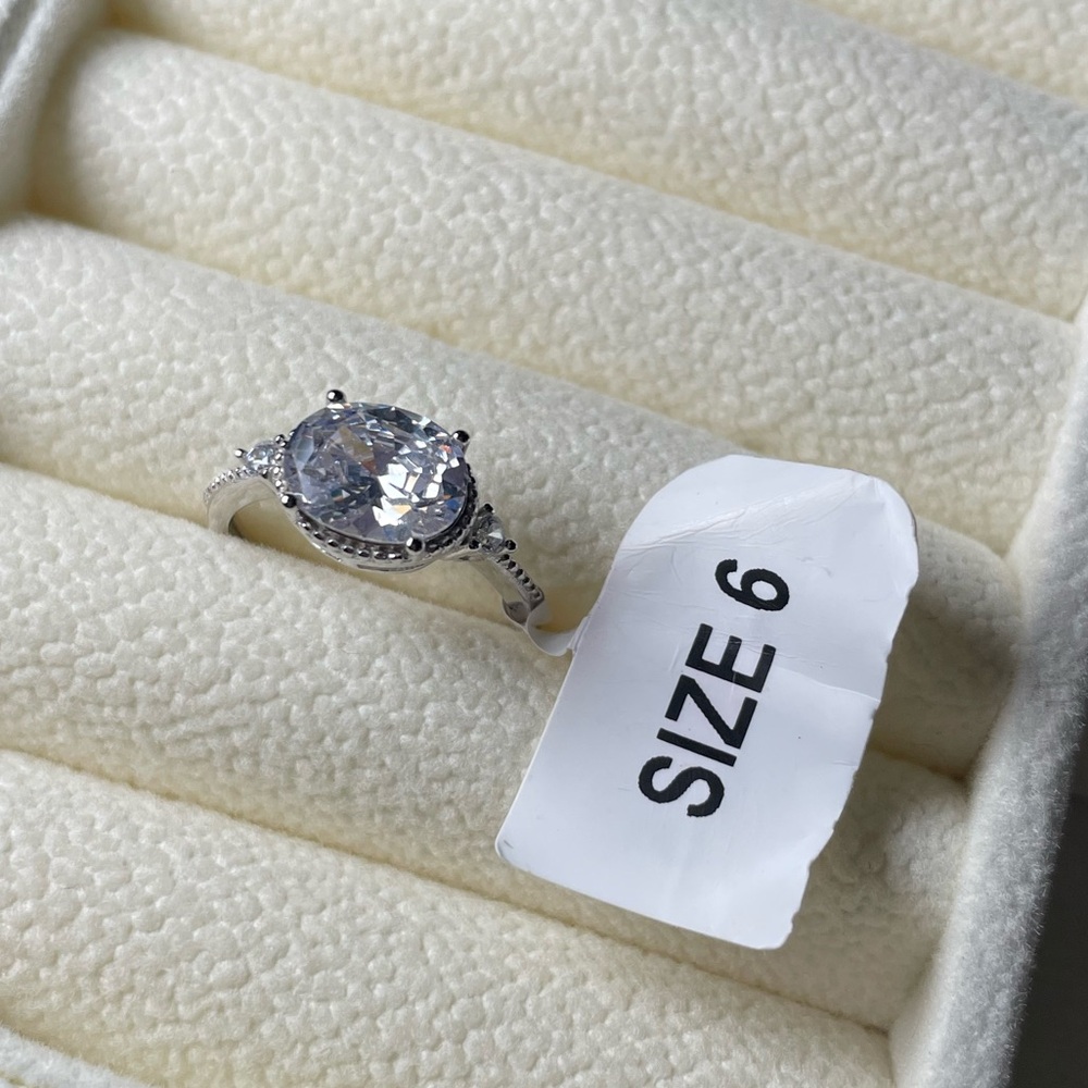 Charmed Aroma - Women's Round Halo Solitaire Ring (Silver)